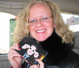 Erica Holds a Picture of Andrew